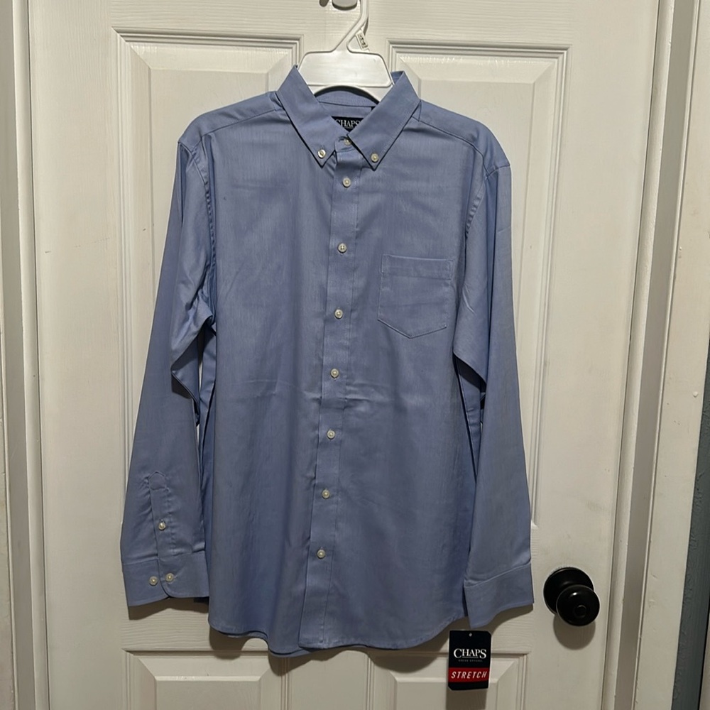 Brand new with tags. Boys Chaps long sleeved button down blue shirt.
